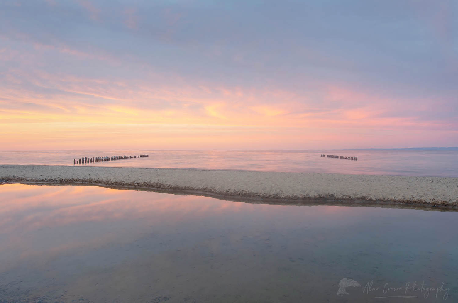 Sunset over Lake Superior seen from beach at Whitefish Point Upper Peninsula Michigan #63793