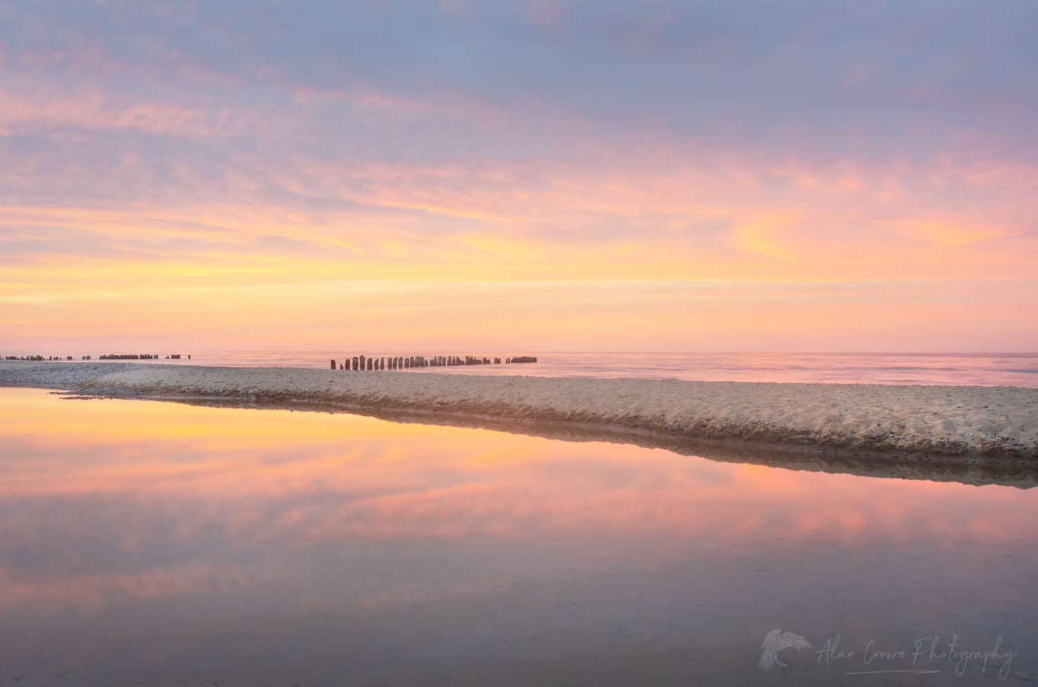 Sunset over Lake Superior seen from beach at Whitefish Point Upper Peninsula Michigan #63794