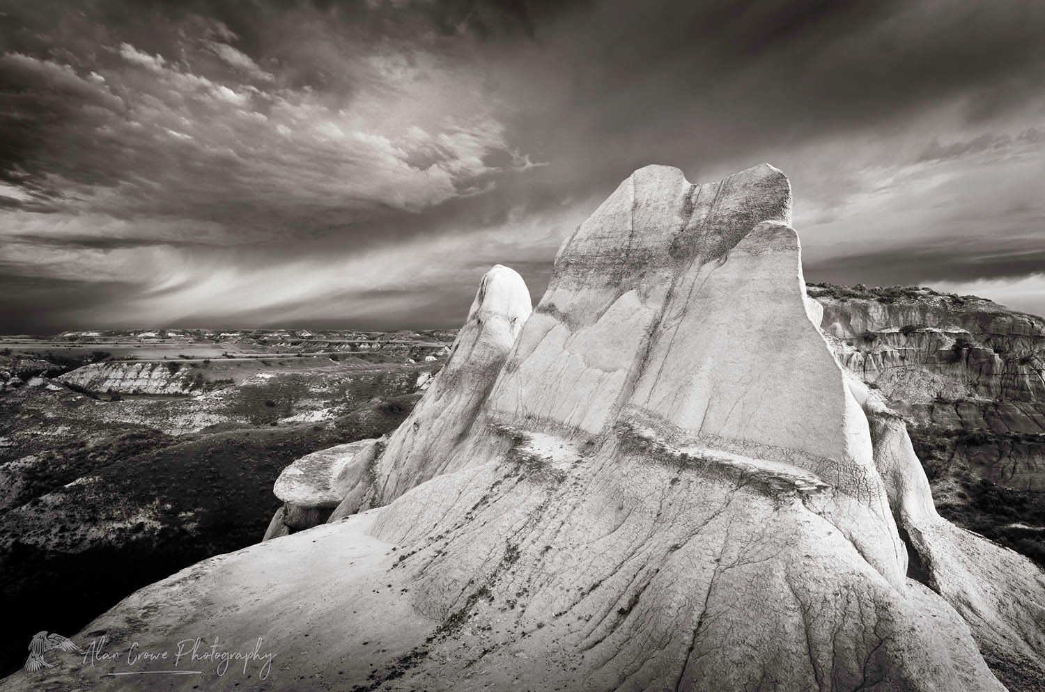 Clearing storm at sunrise over badlands sandstone formations, Theodore Roosevelt National Park, North Dakota #52463bw