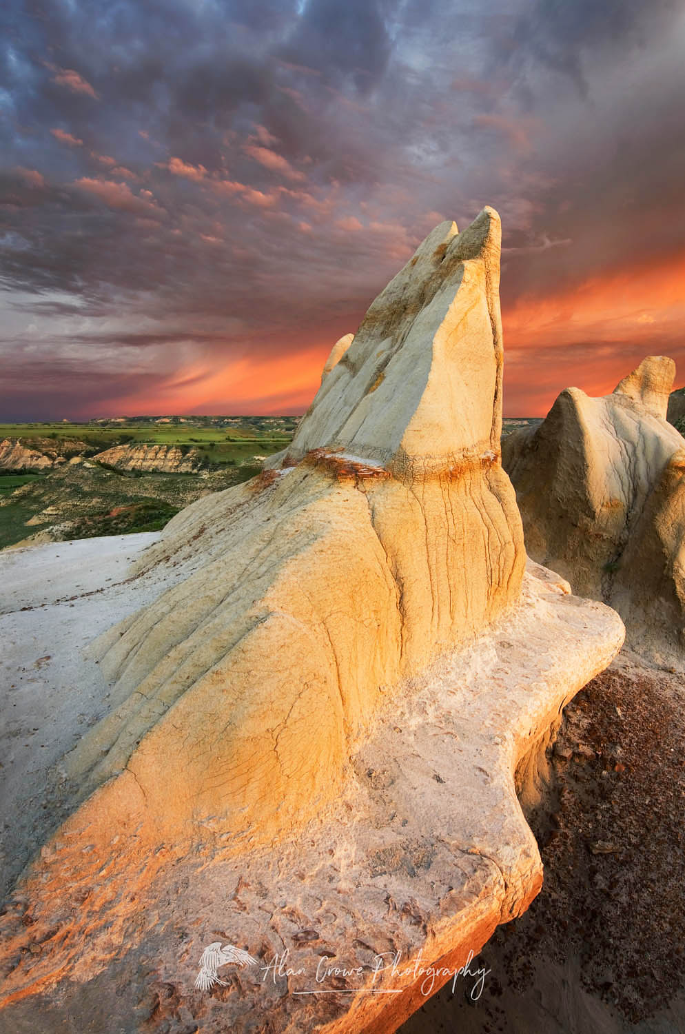 Clearing storm at sunrise over badlands sandstone formations, Theodore Roosevelt National Park, North Dakota #52469