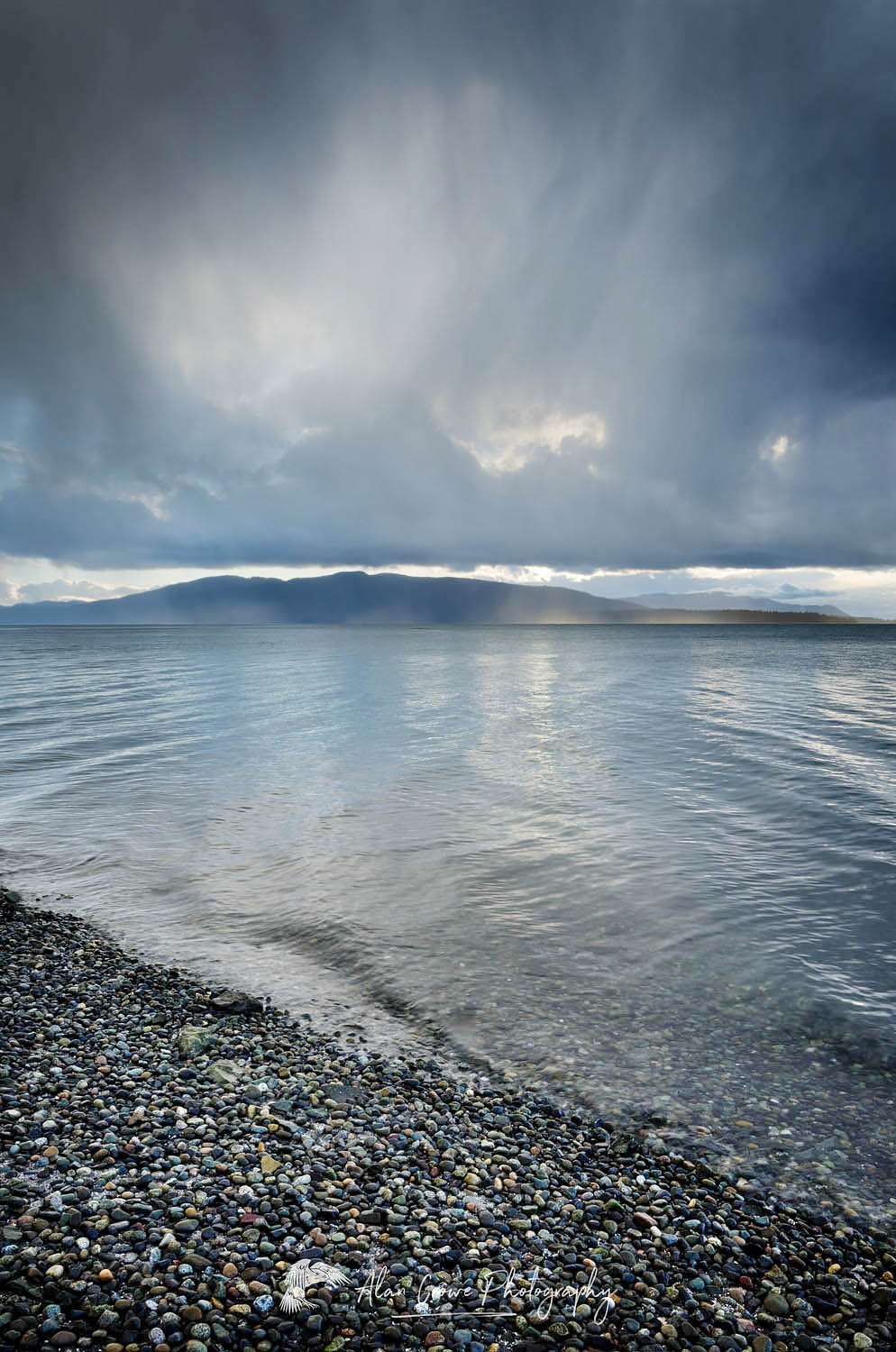 Stormy winter clouds over Bellingham Bay Washington. Lummi Island in the distance #59688