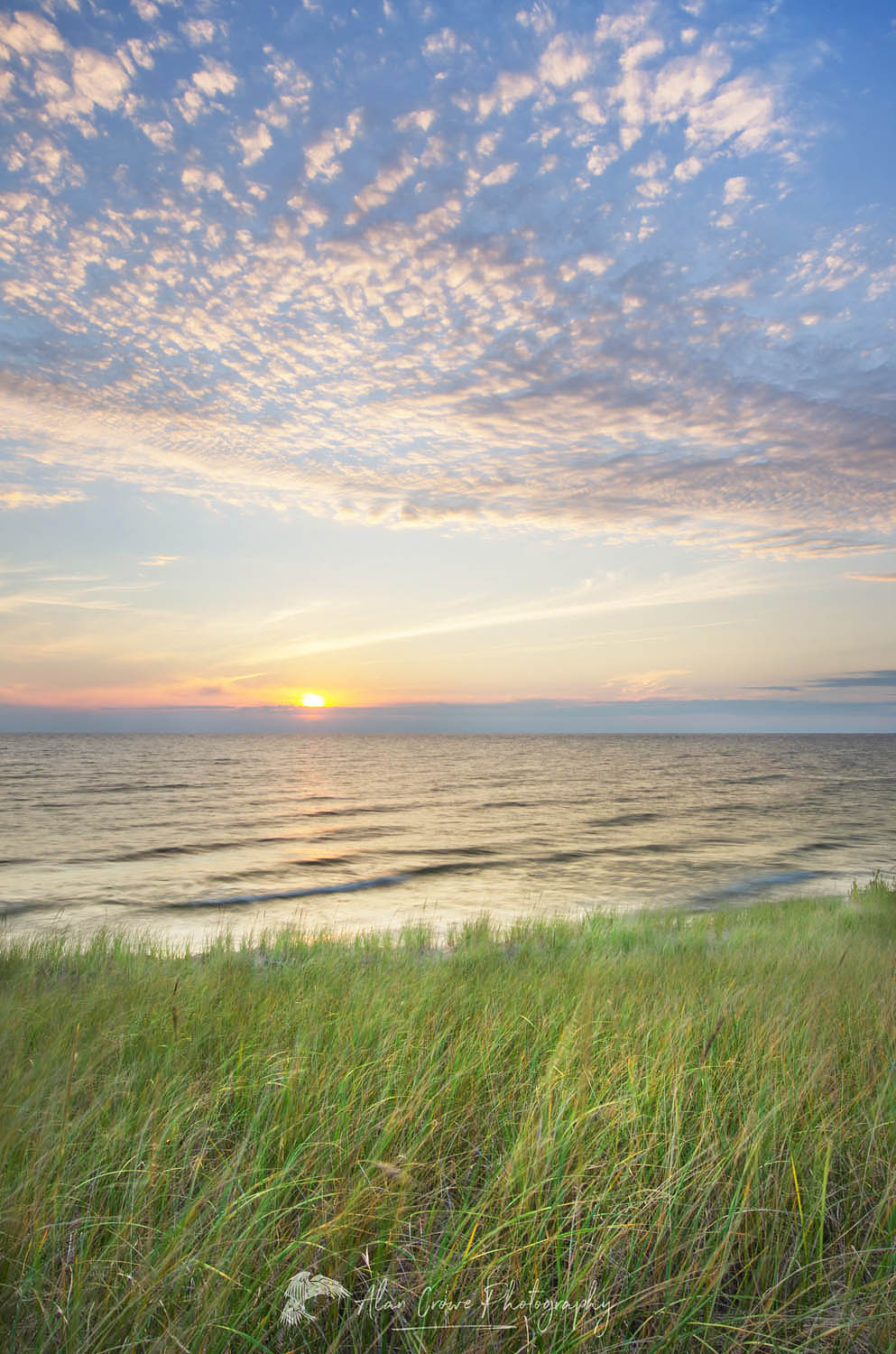 Sunset on the eastern shore of Lake Michigan. Ludington State Park Michigan #63626