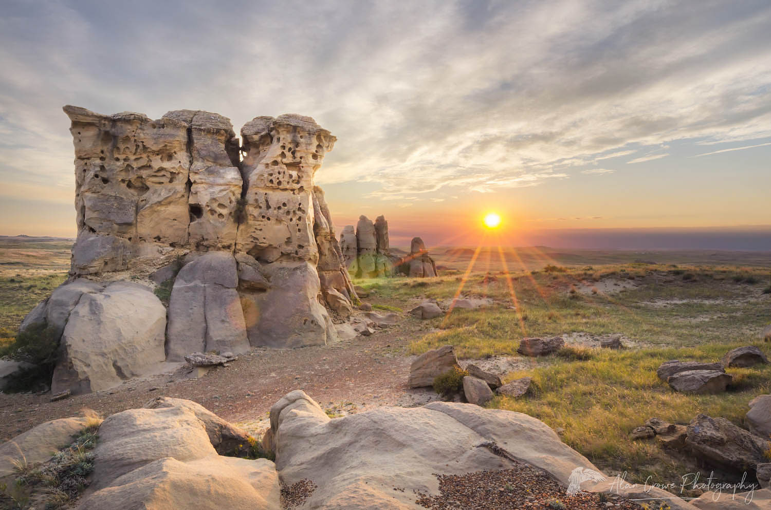 Sunset over sandstone rock formations and prairie of Medicine Rocks State Park, Montana #58400