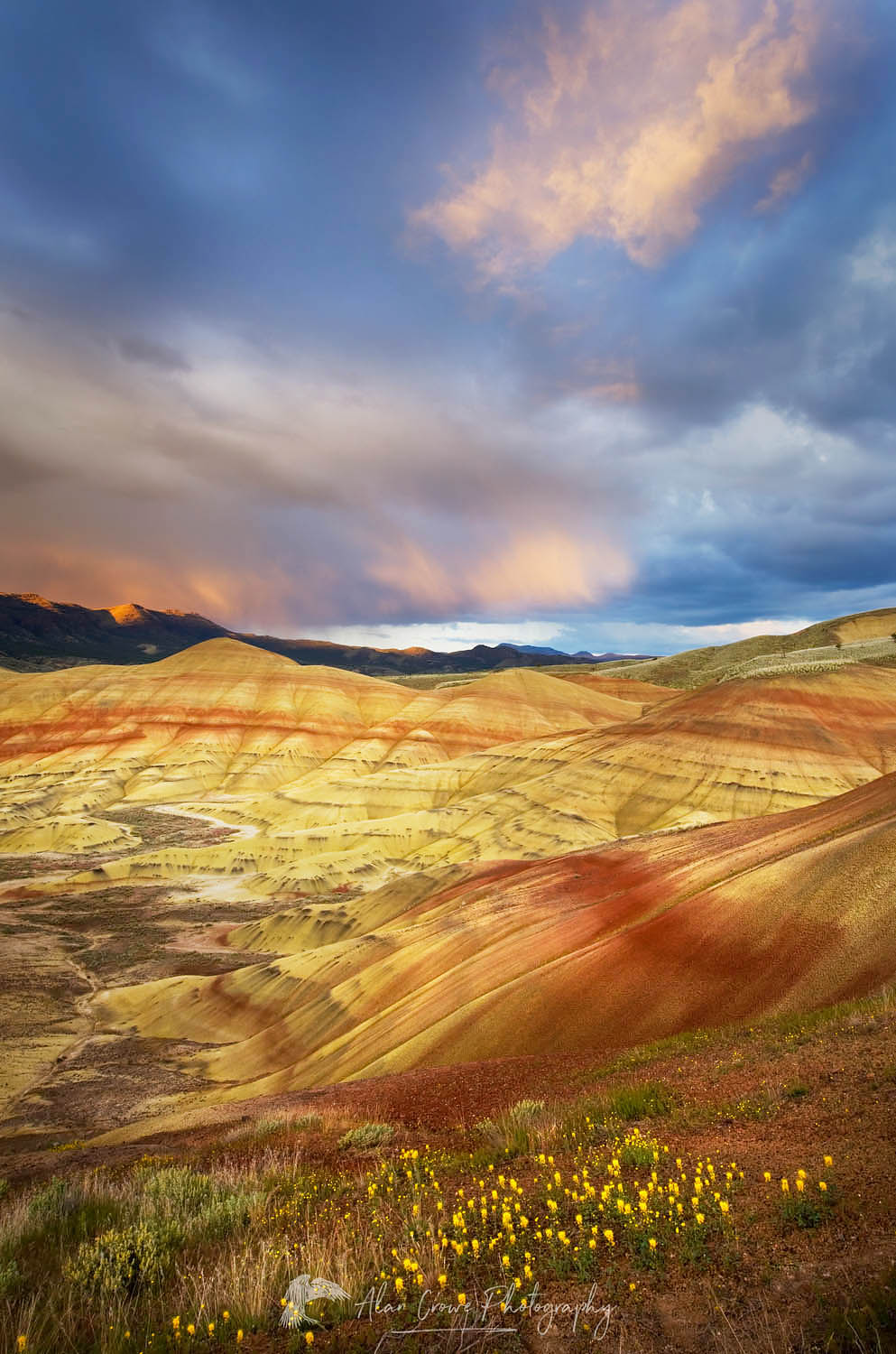 Passing storm at sunset Painted Hills Unit of John Day Fossil Beds National Monument Oregon #44747