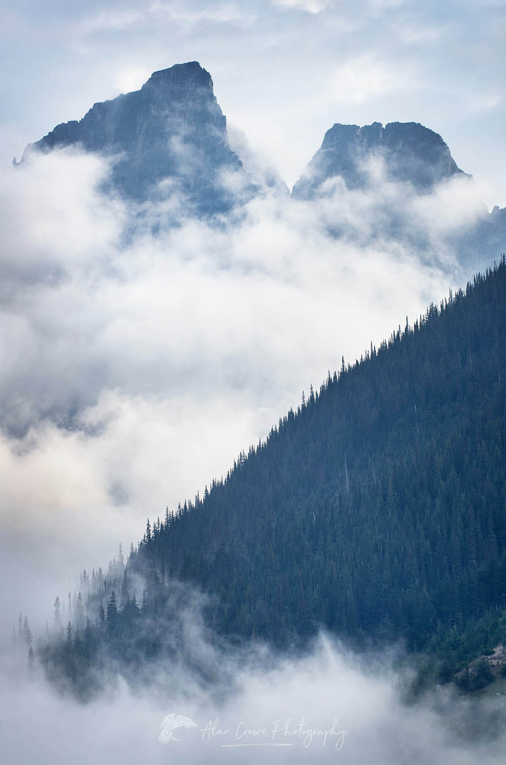 Selkirk Mountains shrouded in mist, Rogers Pass British Columbia #62808