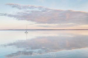 Sailboat and morning clouds refelected in calm waters of Bellingam Bay Washington #64859