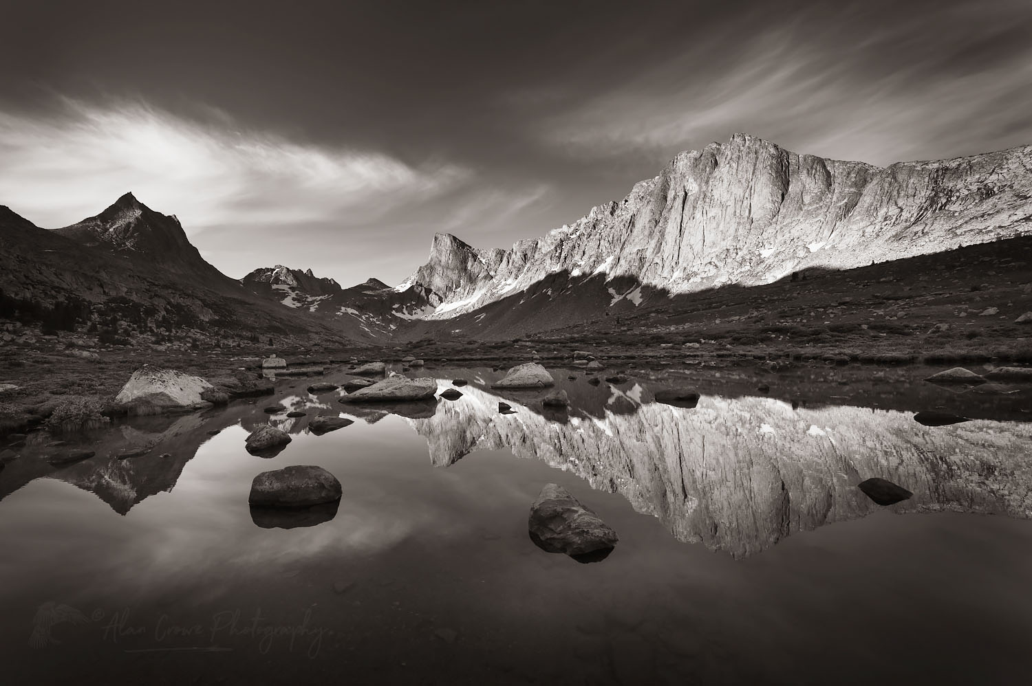 Nylon, Pronghorn, and Dragon Head Peaks reflected in pond near Lee Lake, Bridger Wilderness. Wind River Range, Wyoming #69143bw