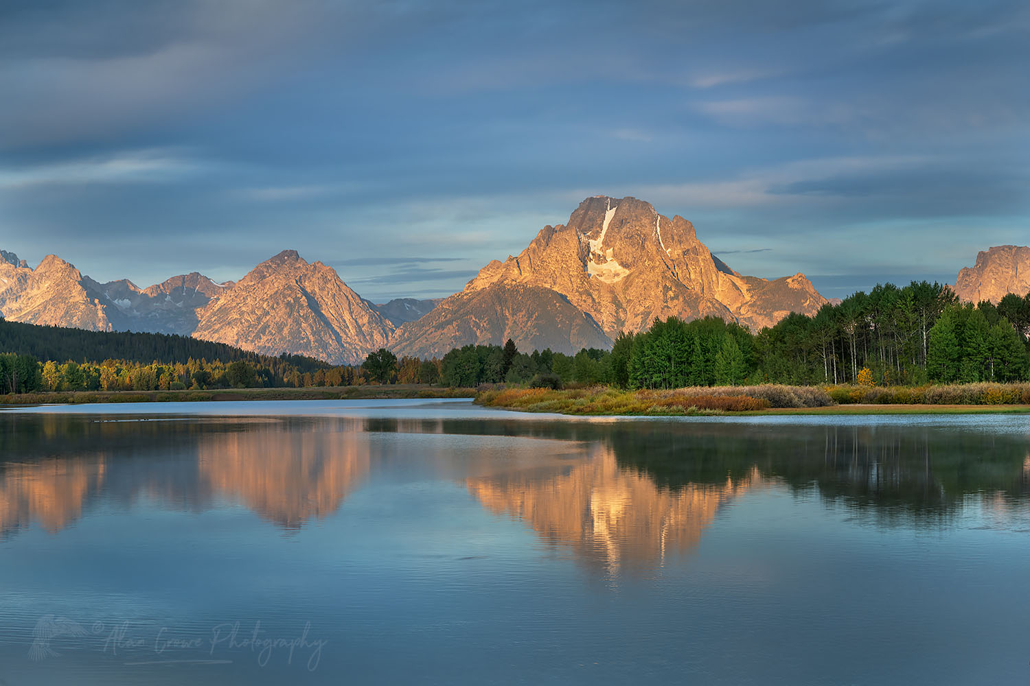 Mount Moran reflected in still waters of the Snake River at Oxbow Bend at sunrise, Grand Teton National Park Wyoming #67724