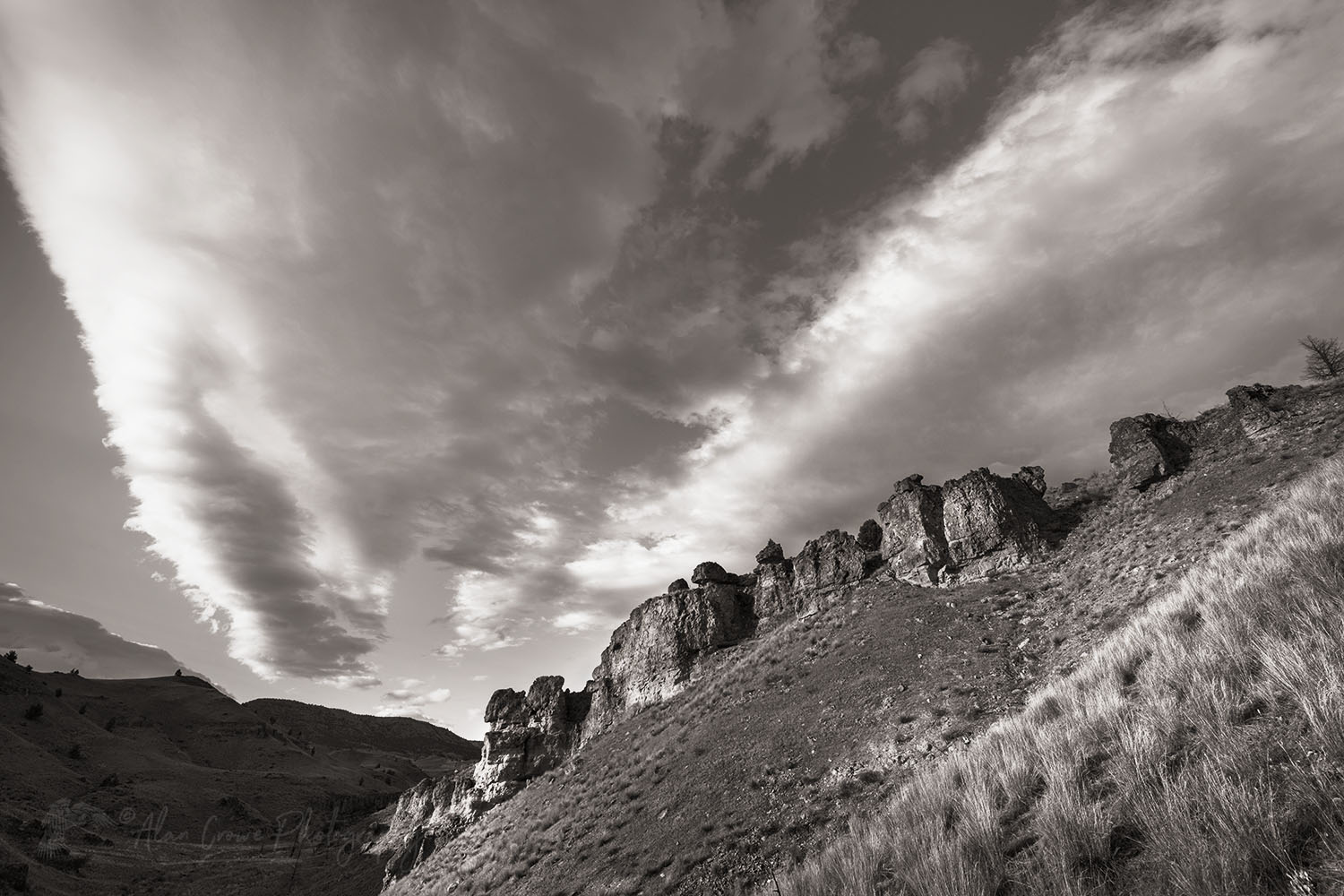 Evening clouds over Clarno Unit of John Day Fossil Beds National Monument Oregon #71299bw
