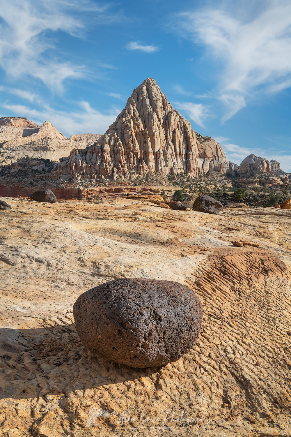Pectols Pyramid and black lava boulders Capitol Reef National Park #75344
