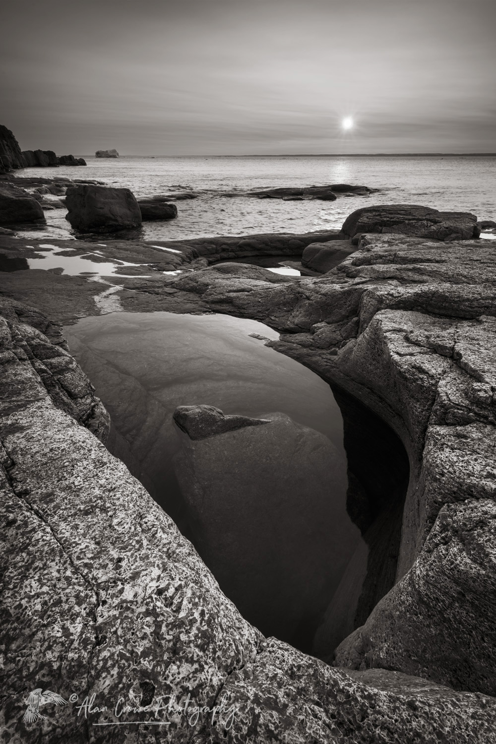 Sunset over Cape Norman on the Great Northern Peninsula. Cape Norman is the northernmost point of insular Newfoundland. Newfoundland and Labrador Canada #80442bw
