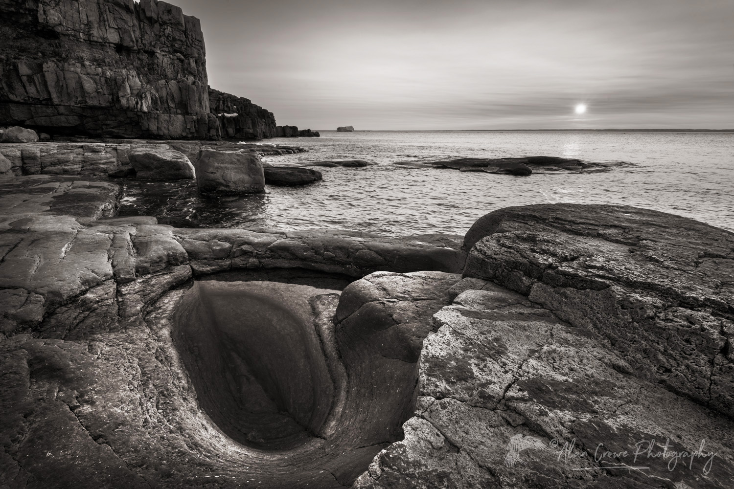 Sunset over Cape Norman on the Great Northern Peninsula. Cape Norman is the northernmost point of insular Newfoundland. Newfoundland and Labrador Canada #80455bw