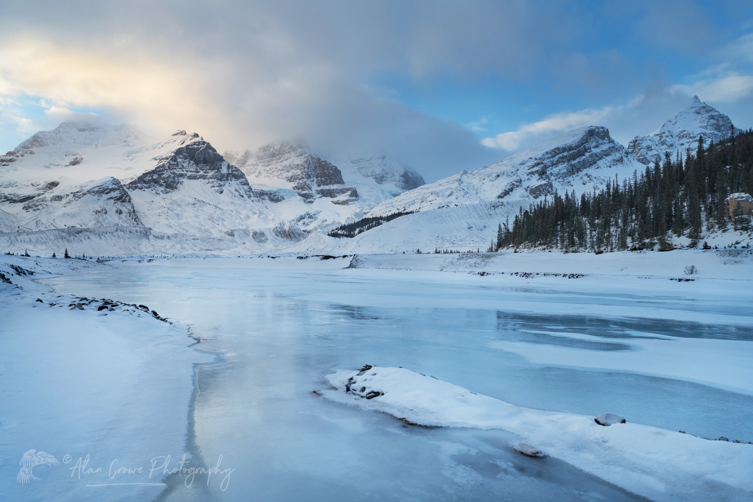 Athabasca River in winter. Mount Andromeda and Mount Athabasca are in the distance. Jasper National Park, Alberta, Canada #82182