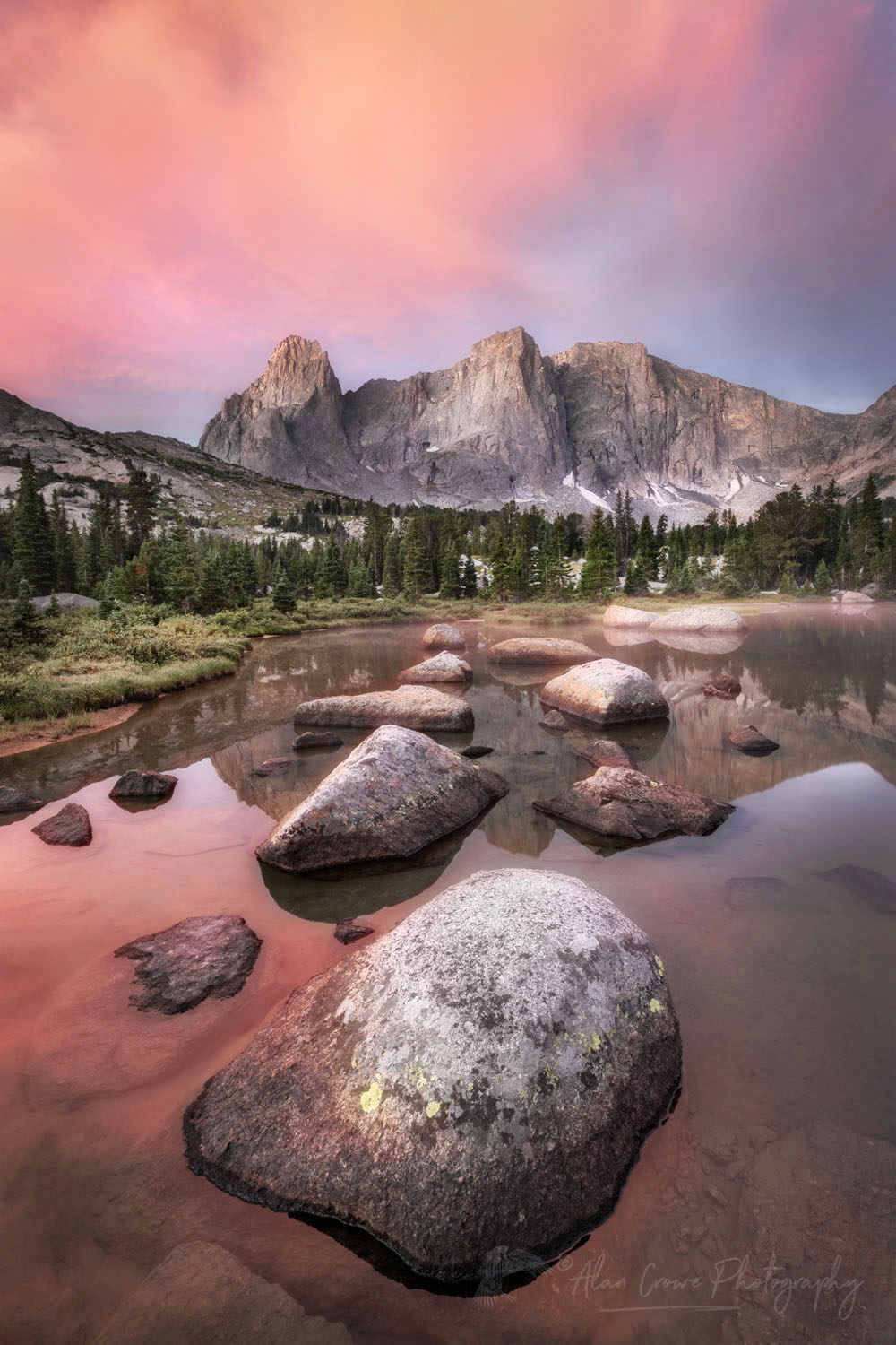 War Bonnet and Warrior Peaks reflected in Lonesome Lake at dawn in Cirque of the Towers, Popo Agie Wilderness, Wind River Range, Wyoming #78375or