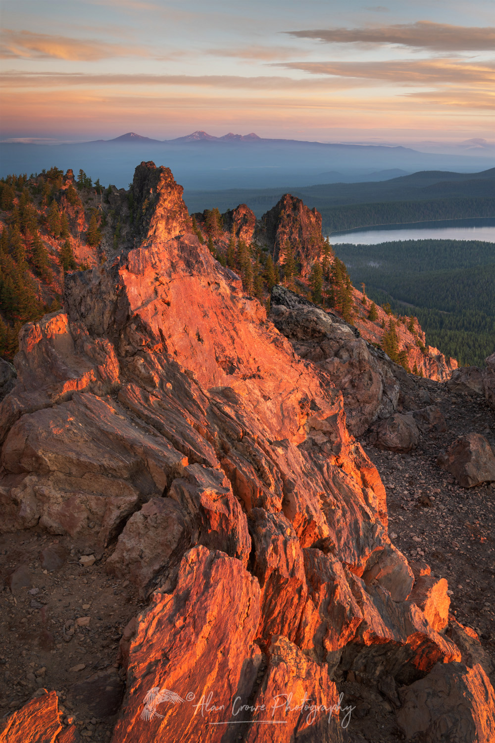 Dramatic sunrise sky over Paulina Lake and the Cascade Range seen from Paulina Peak overlook. Newberry National Volcanic Monument, Oregon #84082